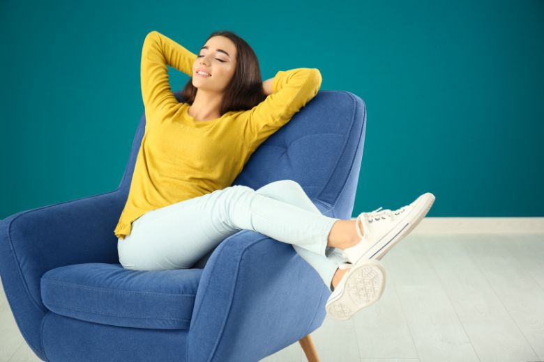 woman sitting on accent chair