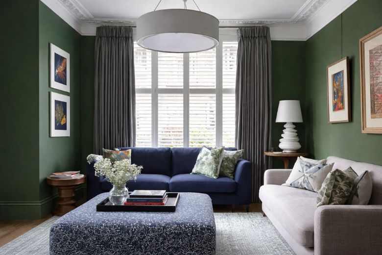 green walls with grey curtains